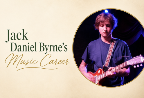Jack Daniel Byrne playing his signature pink Fender Stratocaster guitar